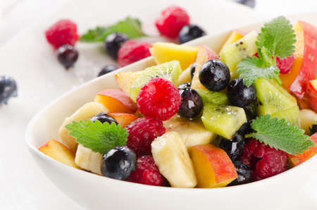 fresh healthy fruit salad with mint leaves. Selective focusの写真素材