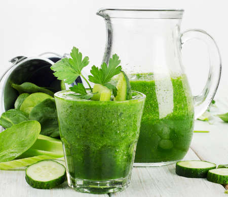 Healthy green smoothie on a wooden table. Selective focusの写真素材