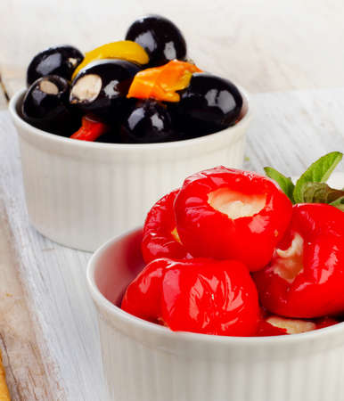 Olives and peppers filed with  cheese. Selective focusの写真素材