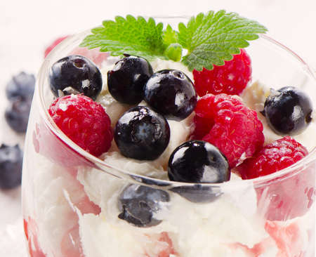 Delicious dessert with fresh berries and mintの写真素材