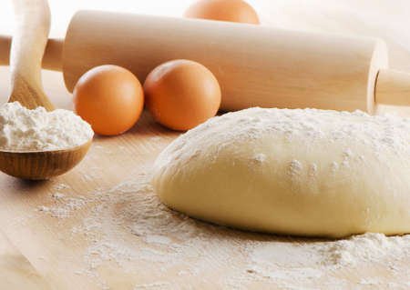 Dough  on a wooden table. Selective focusの写真素材