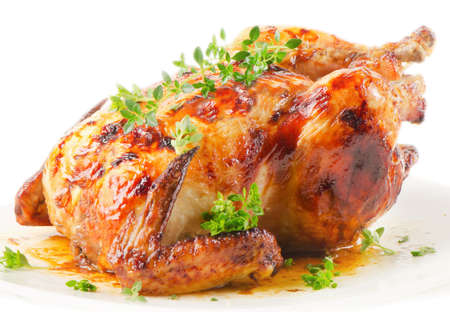 roast chicken isolated on a white backgroundの写真素材