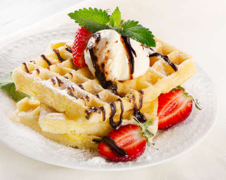 Sweet Waffles with fresh berries and ice creamの写真素材