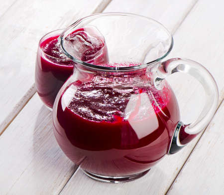 Beetroot juice in a glass jugの写真素材