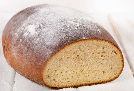 Bread on a cutting board. Selective focusの写真素材