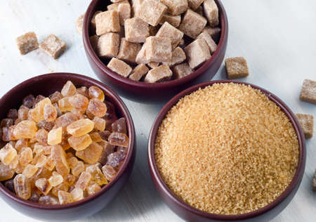 Brown sugar in clay bowl. Selective focusの写真素材