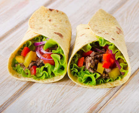 tortilla wraps with meat and vegetables. Selective focusの写真素材
