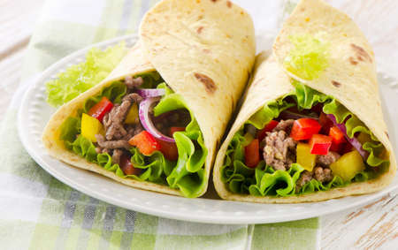 tortilla wraps with meat and vegetables. Selective focusの写真素材