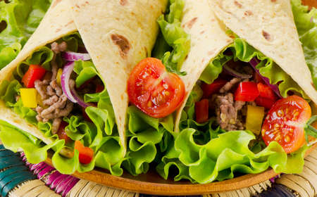 tortilla wraps with meat and vegetables. Selective focusの写真素材