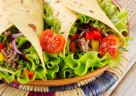 tortilla wraps with meat and vegetables. Selective focusの写真素材