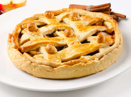 Apple pie  and spices on white plate. Selective focusの写真素材