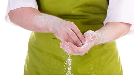 chefs  hands with flour isolated on a white backgroundの写真素材