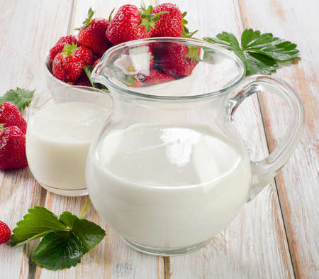 Healthy breakfast - milk and  fresh strawberries. Selective focusの写真素材