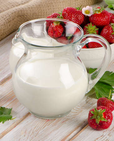 Healthy breakfast - milk and  fresh strawberries. Selective focusの写真素材