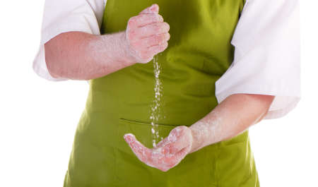 chefs  hands with flour isolated on a white backgroundの写真素材