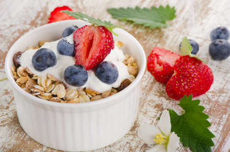 Muesli and yogurt with fresh berries. Selective focusの写真素材