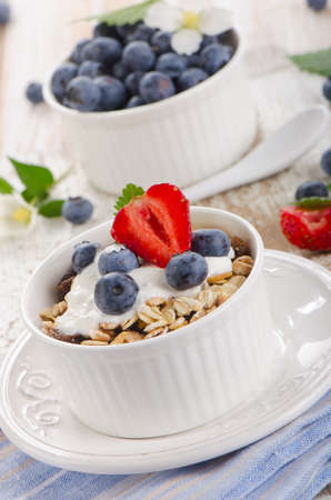 Muesli and yogurt with fresh berries. Selective focusの写真素材