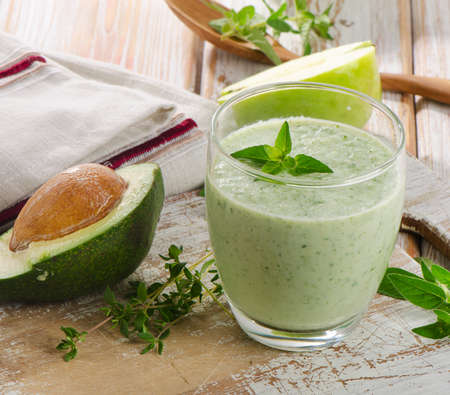 Green  smoothie on a wooden table. Selective focusの写真素材