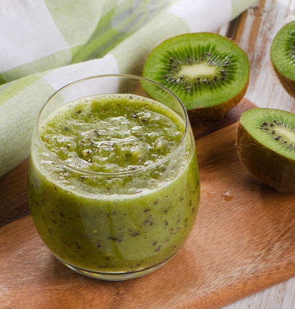 Healthy kiwi smoothie in a glass. Selective focusの写真素材