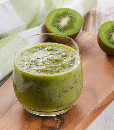 Healthy kiwi smoothie in a glass. Selective focusの写真素材