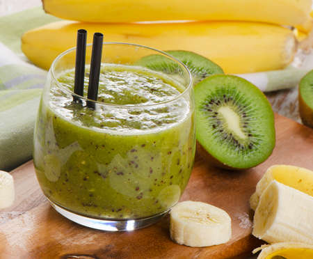 Healthy fruit smoothie in a glass.  Selective focusの写真素材