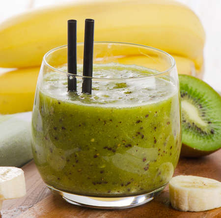 Healthy fruit smoothie in a glass.  Selective focusの写真素材