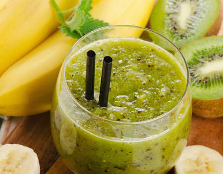 Healthy fruit smoothie in a glass.  Selective focusの写真素材