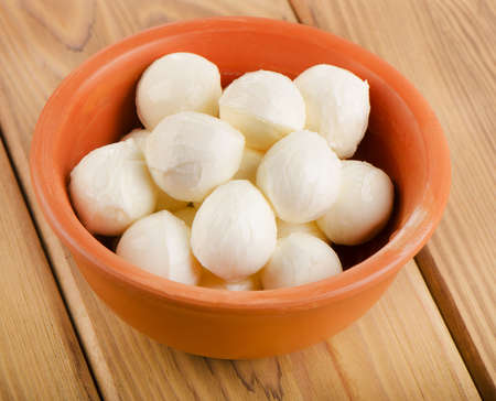 Small balls of mozzarella in bowl. Selective focusの写真素材