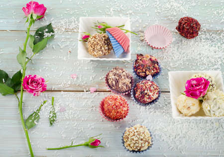Chocolate sweet handmade candies on a wooden tableの写真素材