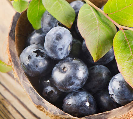 Fresh blueberries on a wooden background  Selective focusの写真素材