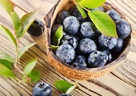 Fresh blueberries on a wooden background  Selective focusの写真素材