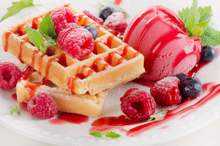 Belgian waffles with raspberries sorbet. Selective focusの写真素材