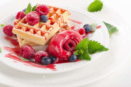 Belgian waffles with raspberries sorbet. Selective focusの写真素材
