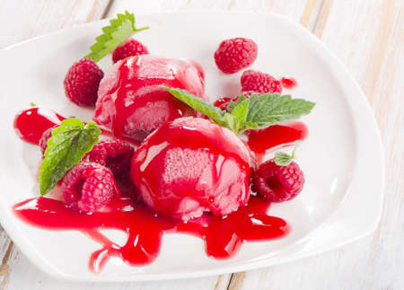 Raspberry sorbet with fresh mint. Selective focusの写真素材
