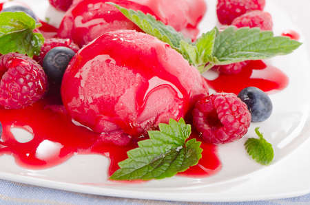 Raspberry sorbet with fresh mint. Selective focusの写真素材