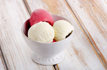 Ice cream on a wooden table. Selective focusの写真素材