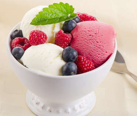 Ice cream with  fresh berries. Selective focusの写真素材