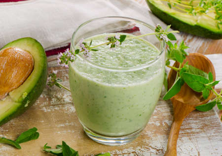 Green  smoothie on a wooden table. Selective focusの写真素材