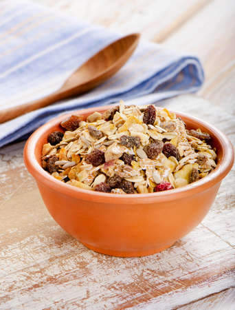 Bowl of Muesli  on a Wooden table. Selective focusの写真素材