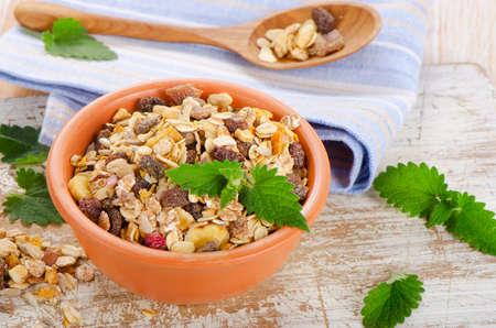 Bowl of Muesli  on a Wooden table. Selective focusの写真素材