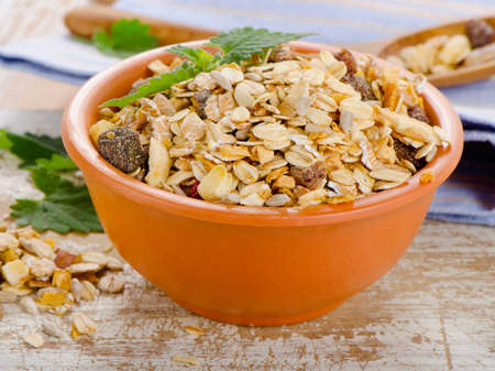 Bowl of Muesli  on a Wooden table. Selective focusの写真素材