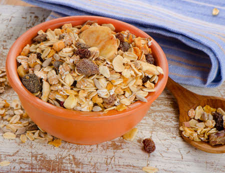 Bowl of Muesli  on a Wooden table. Selective focusの写真素材