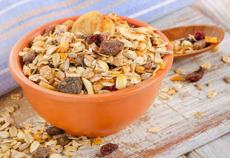 Bowl of Muesli  on a Wooden table. Selective focusの写真素材