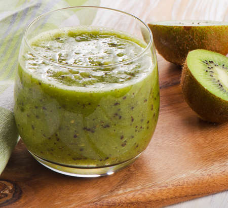 Healthy kiwi smoothie in a glass. Selective focusの写真素材