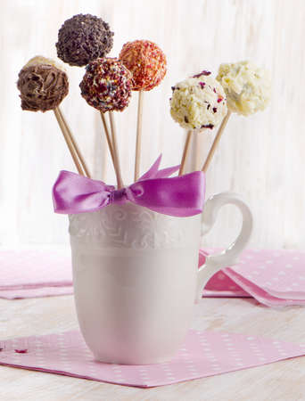 Cake pops in a white cup . Selective focusの写真素材