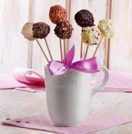 Cake pops in a white cup . Selective focusの写真素材
