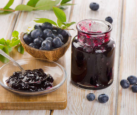 Fresh blueberries jam in a glass  jar  Selective focusの写真素材