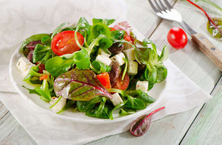 Salad with feta and greek olives . Selective focusの写真素材