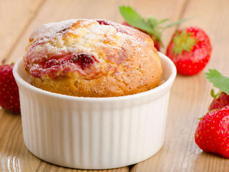 Delicious homemade berry muffin with fresh berries . Selective focusの写真素材