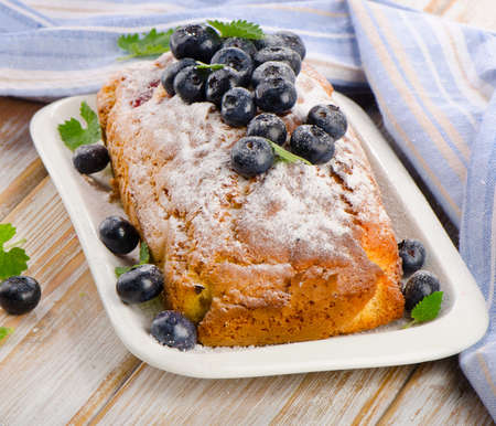 Delicious homemade blueberry cake with fresh blueberries . Selective focusの写真素材